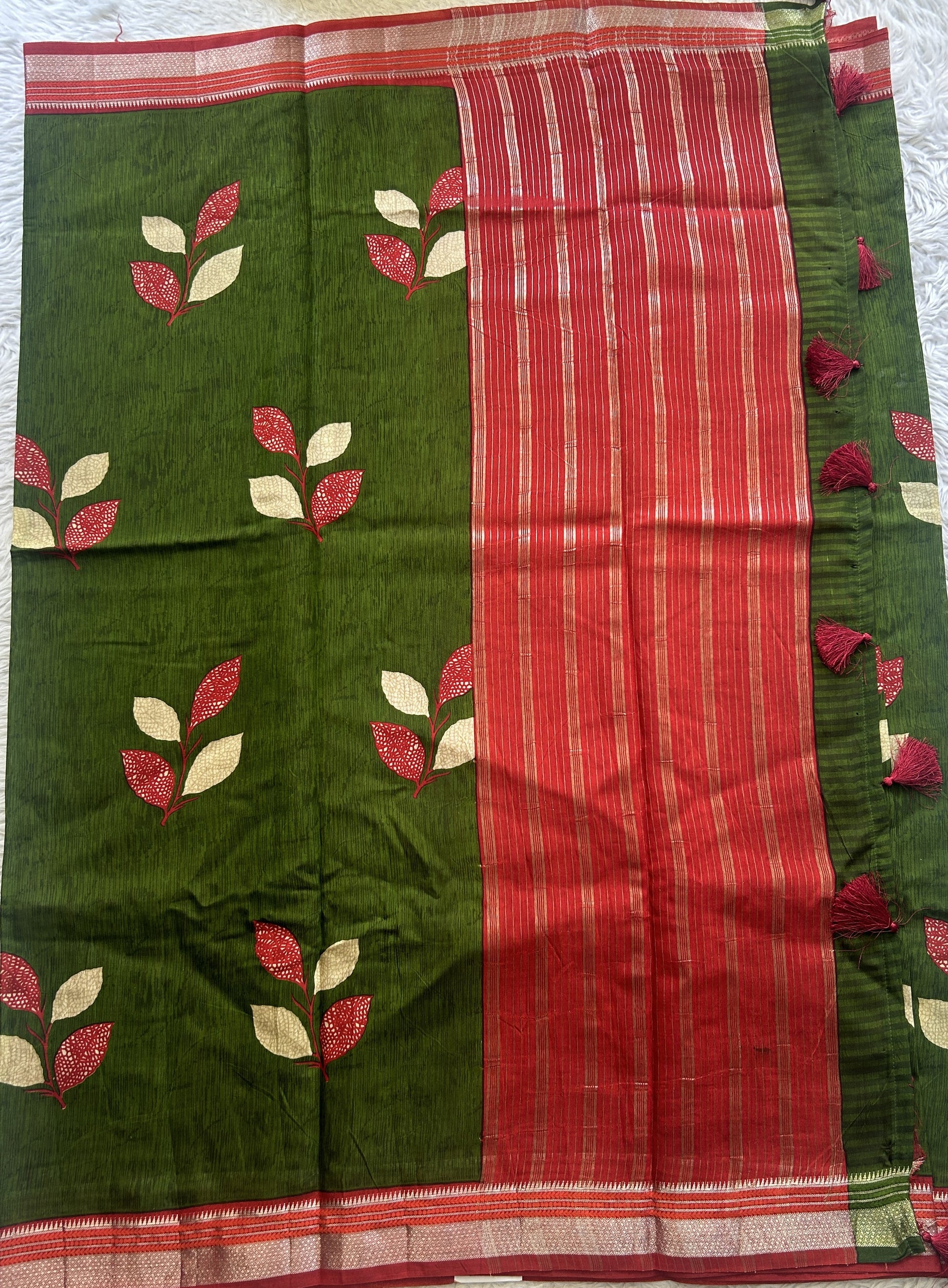 Dola Crepe Saree Leaf Green Colored Complemented with a Zari Border. - Sampradaya Designer Studio