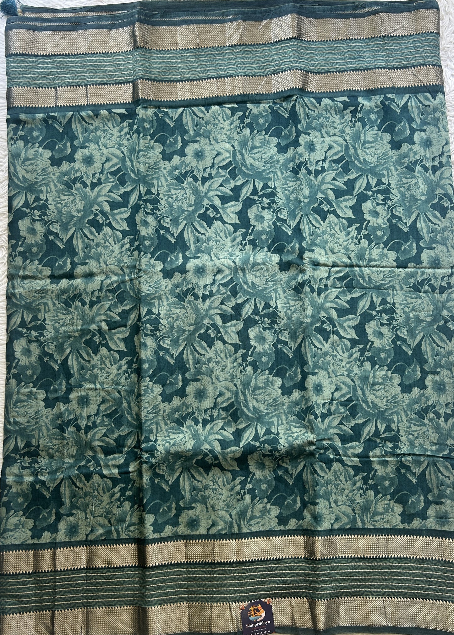 Dola Crepe Saree Teal Colored Complemented with a Zari Border. - Sampradaya Designer Studio