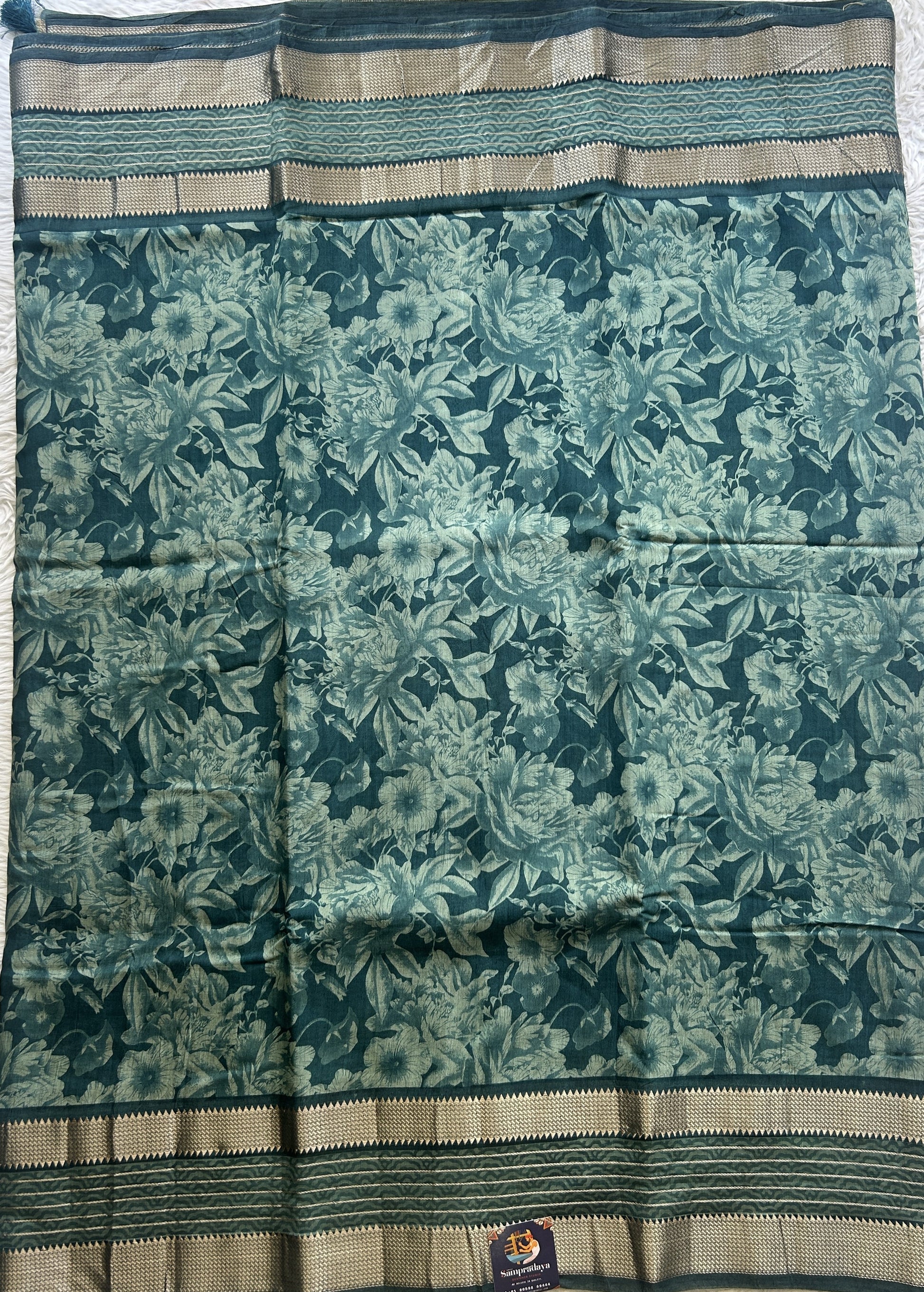 Dola Crepe Saree Teal Colored Complemented with a Zari Border. - Sampradaya Designer Studio
