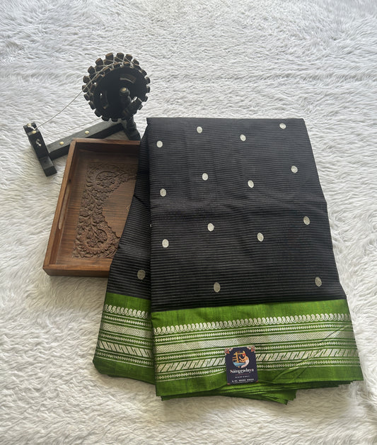 Gadwal Sico Saree Black colored complemented with a Light Green Zari Border. - Sampradaya Designer Studio