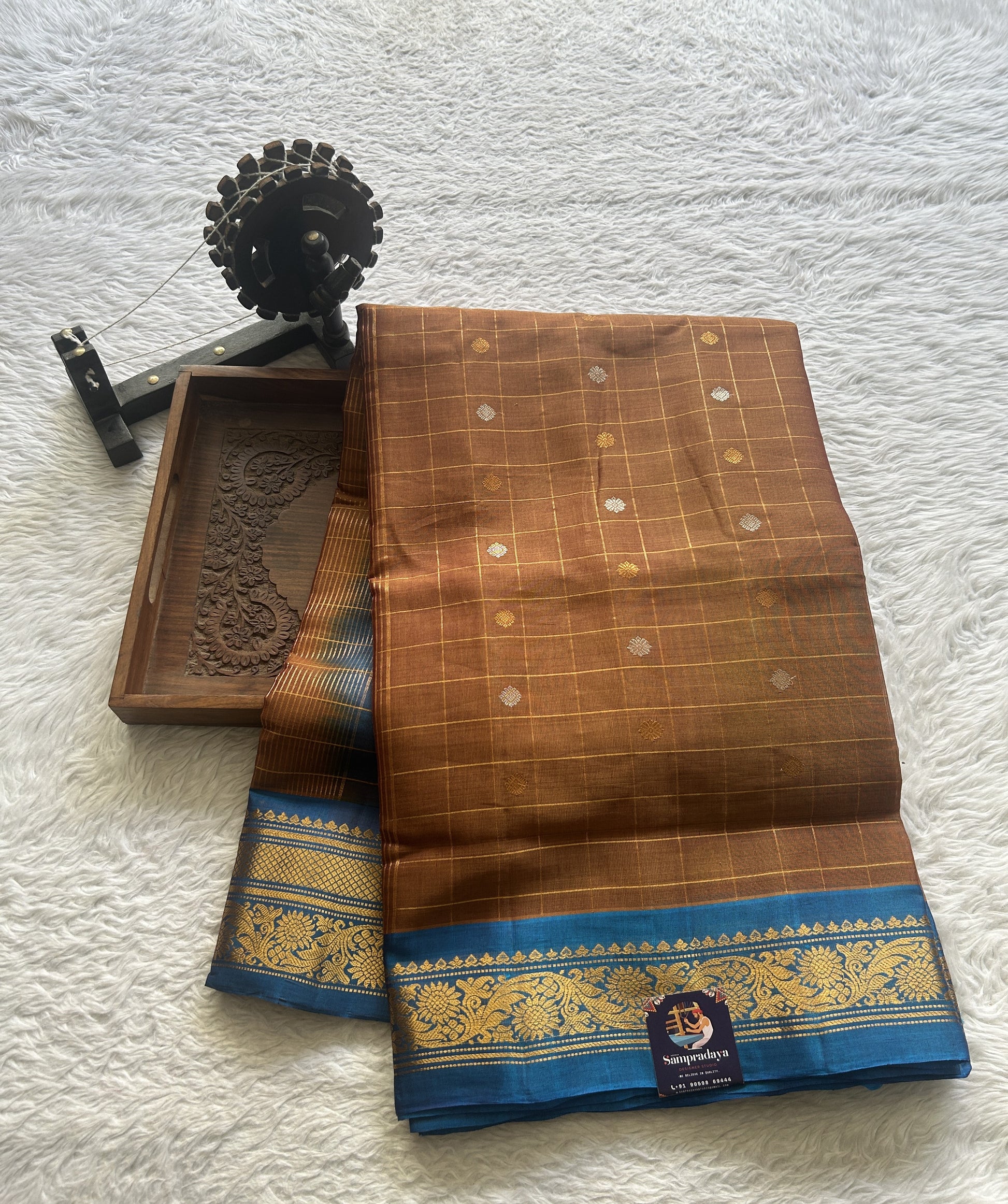Gadwal Sico Saree Light Brown colored complemented with a Blue Zari Border. - Sampradaya Designer Studio