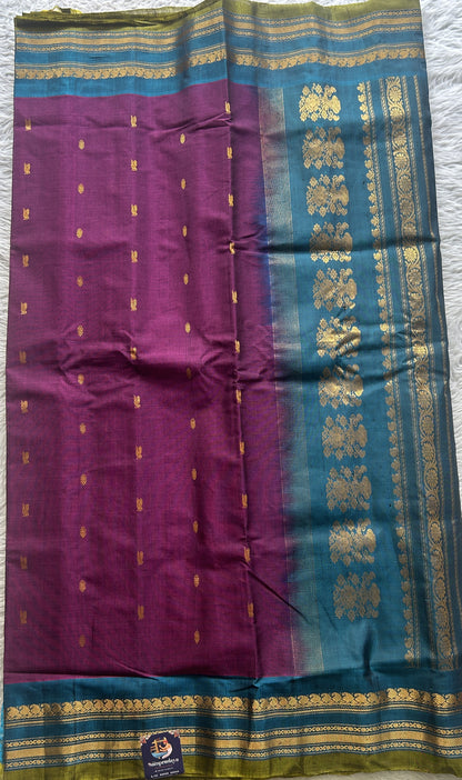 Gadwal Sico Saree Dark Purple colored complemented with a Blue Zari Border. - Sampradaya Designer Studio