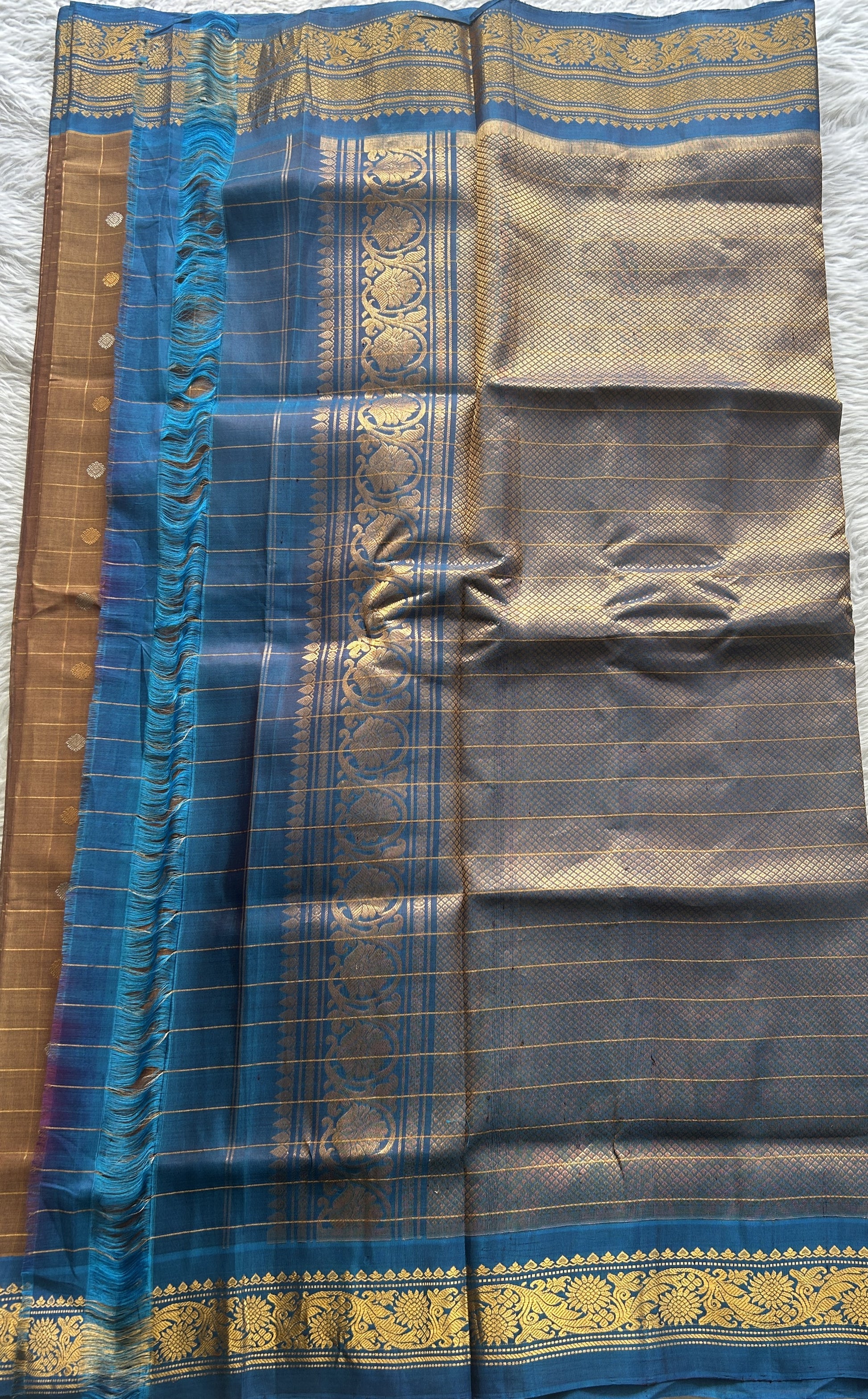 Gadwal Sico Saree Light Brown colored complemented with a Blue Zari Border. - Sampradaya Designer Studio