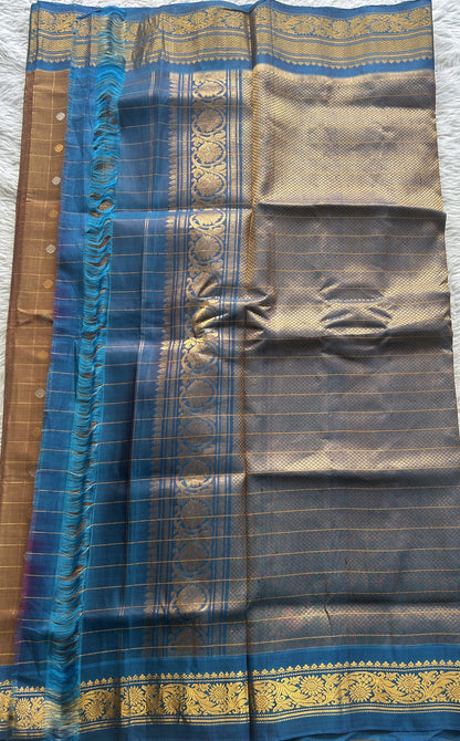 Gadwal Sico Saree Light Brown colored complemented with a Blue Zari Border. - Sampradaya Designer Studio