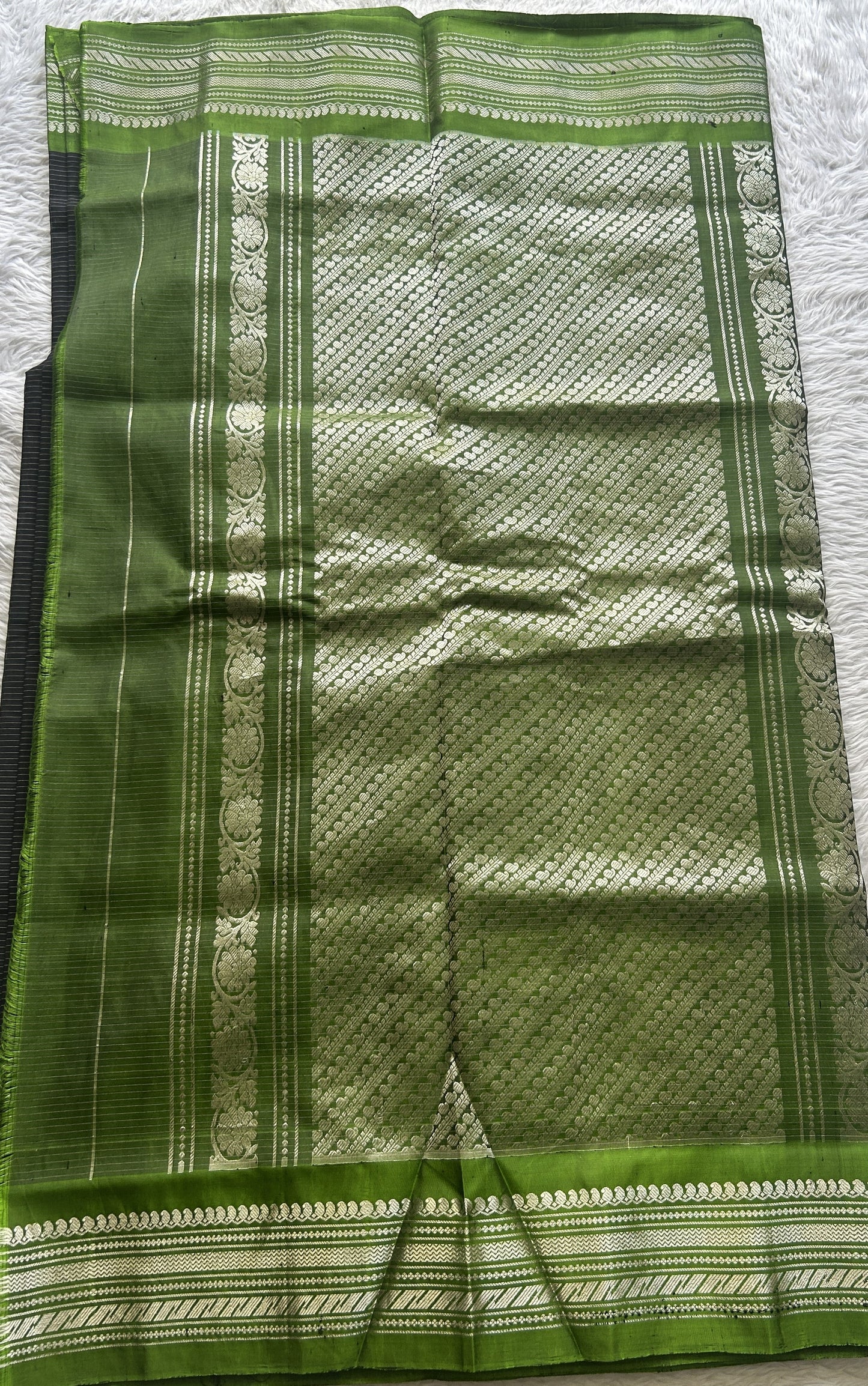 Gadwal Sico Saree Black colored complemented with a Light Green Zari Border. - Sampradaya Designer Studio
