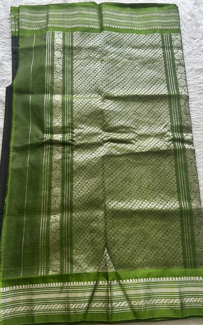 Gadwal Sico Saree Black colored complemented with a Light Green Zari Border. - Sampradaya Designer Studio