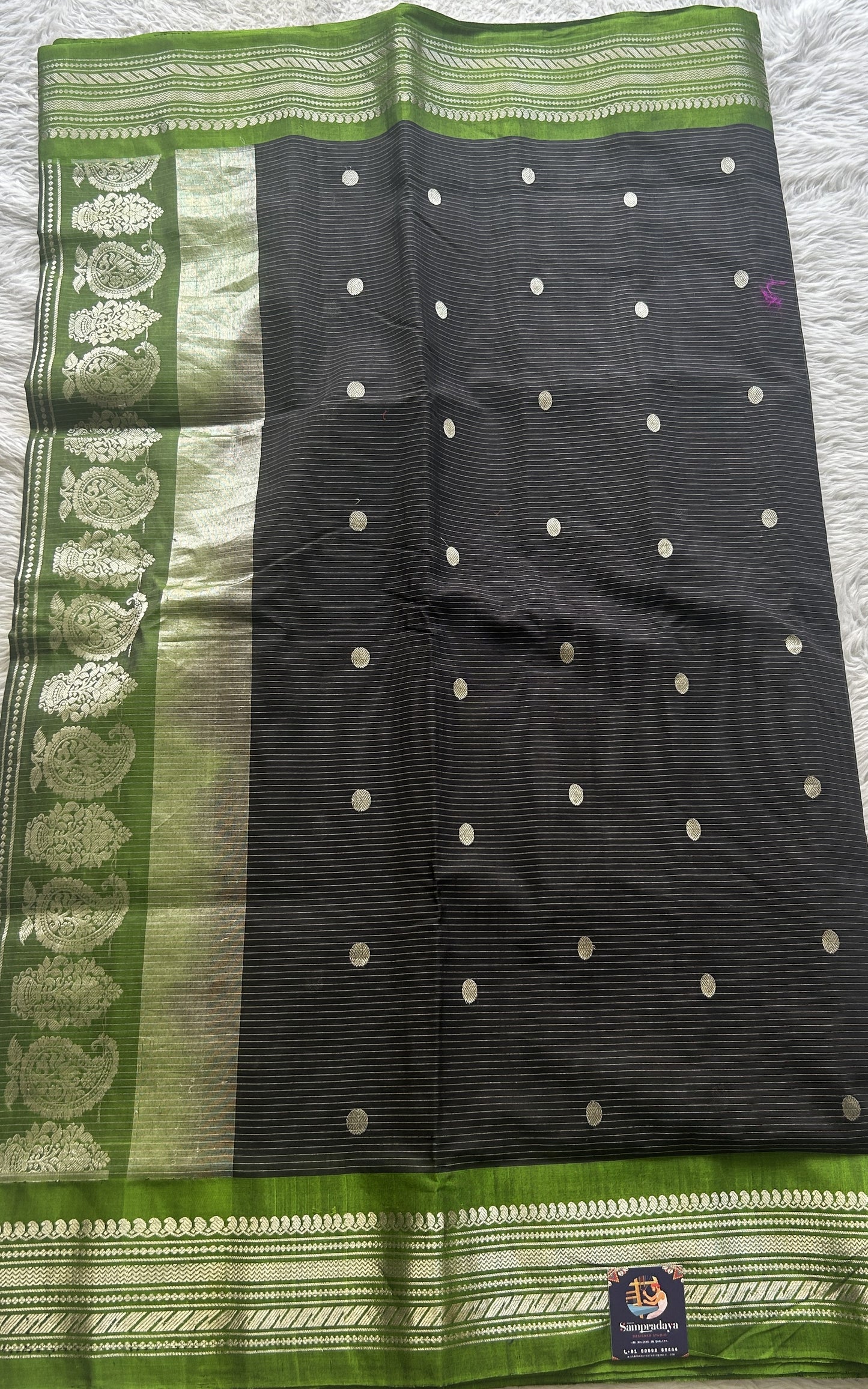 Gadwal Sico Saree Black colored complemented with a Light Green Zari Border. - Sampradaya Designer Studio