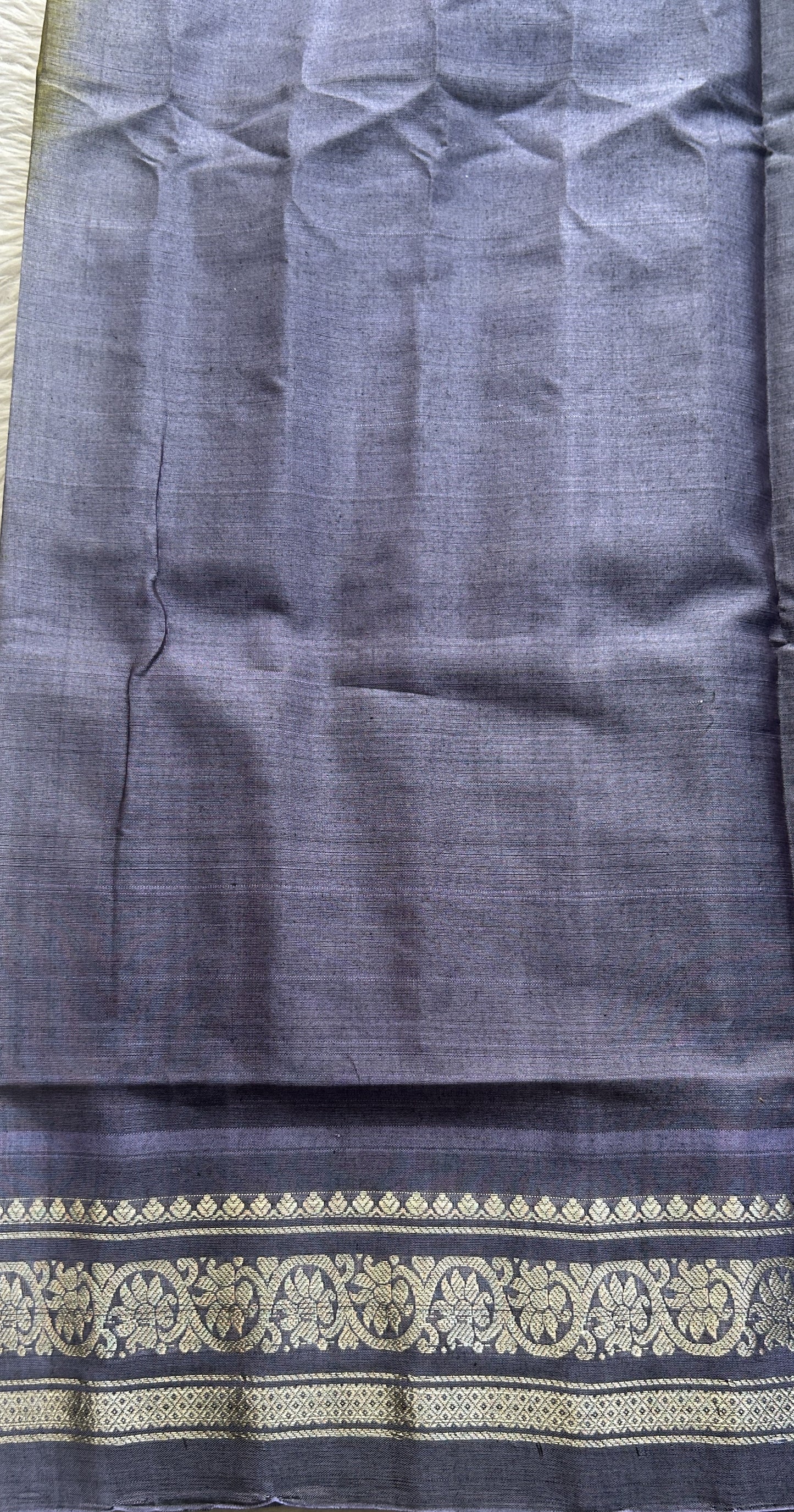 Gadwal Sico Saree Green colored complemented with a Lilac Zari Border. - Sampradaya Designer Studio
