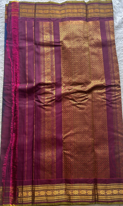 Gadwal Sico Saree Ink Blue colored complemented with a Purple Zari Border. - Sampradaya Designer Studio