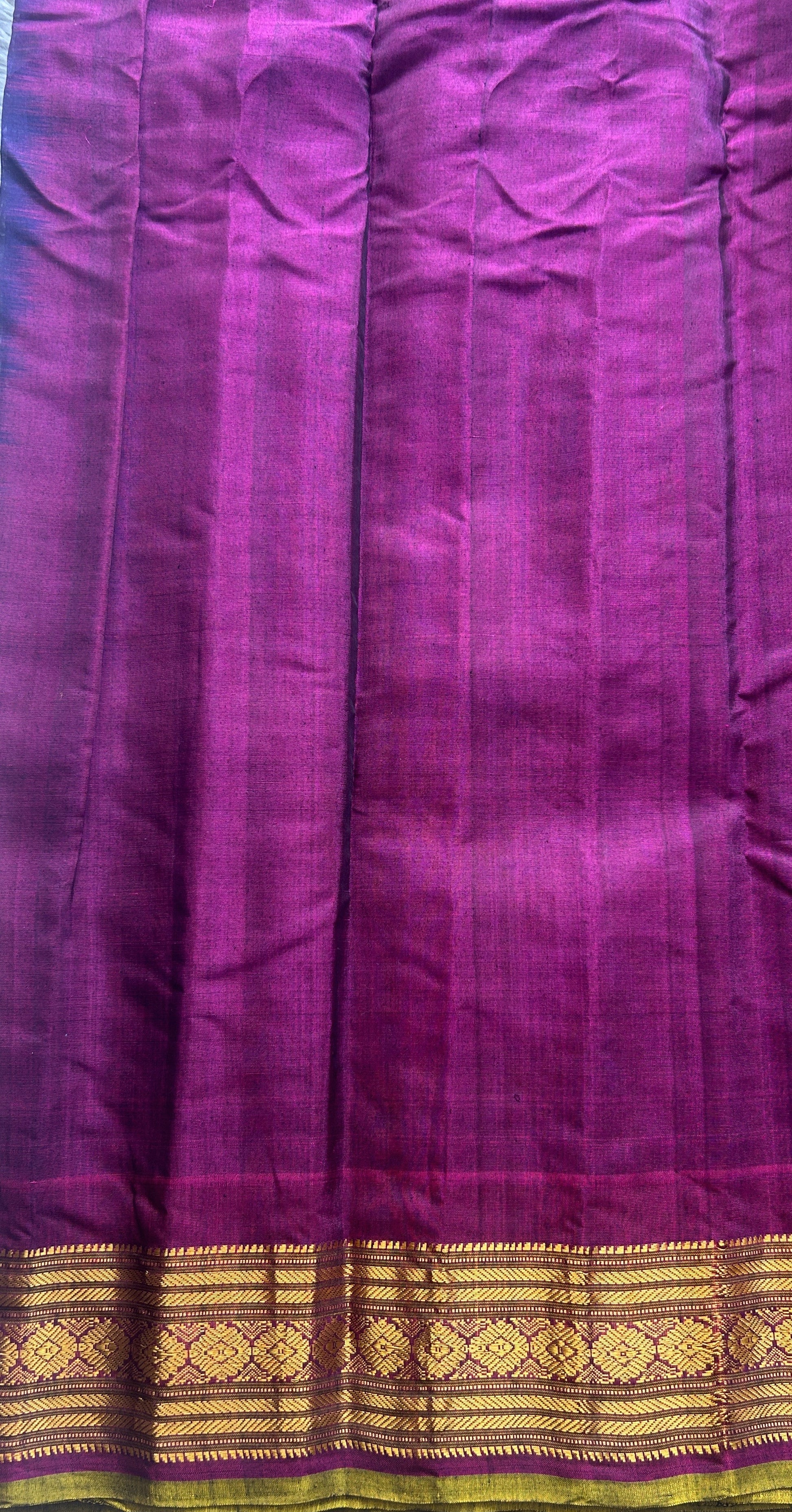 Gadwal Sico Saree Ink Blue colored complemented with a Purple Zari Border. - Sampradaya Designer Studio