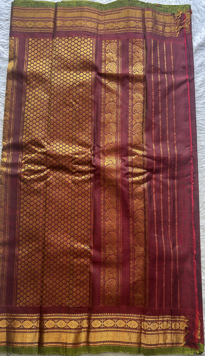 Gadwal Sico Saree Dark Green colored complemented with a Maroon Zari Border. - Sampradaya Designer Studio