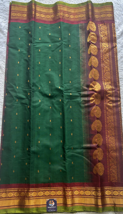 Gadwal Sico Saree Dark Green colored complemented with a Maroon Zari Border. - Sampradaya Designer Studio