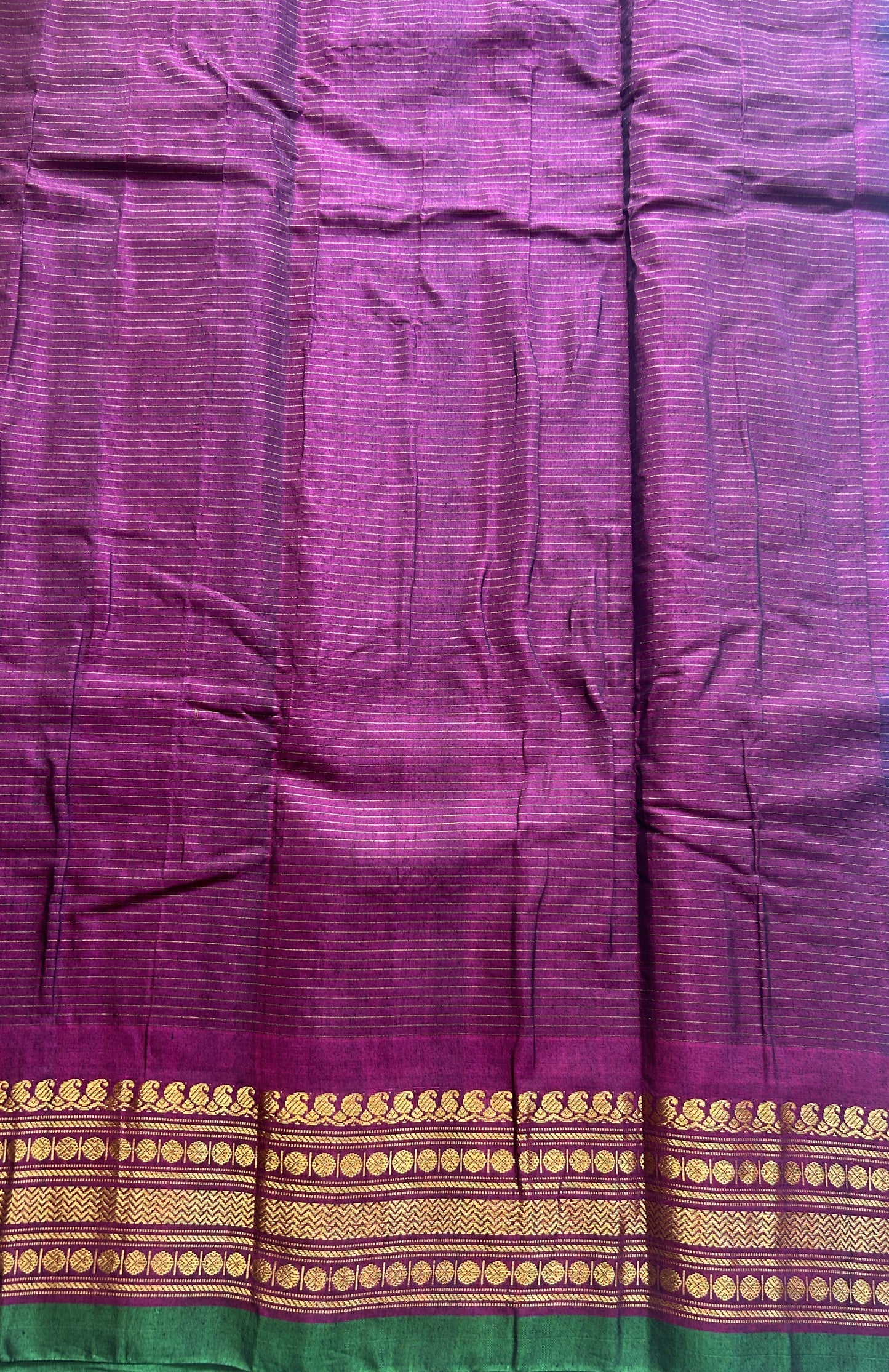 Gadwal Sico Saree Navy Blue colored complemented with a Purple Zari Border. - Sampradaya Designer Studio