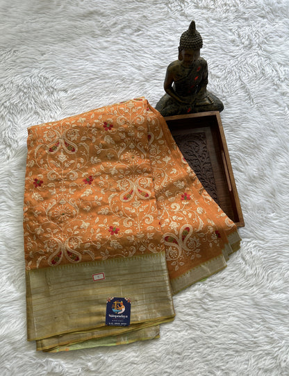 Mangalagiri Chikankari Saree Orange colored complemented with a Mangalagiri Kanchi Border. - Sampradaya Designer Studio