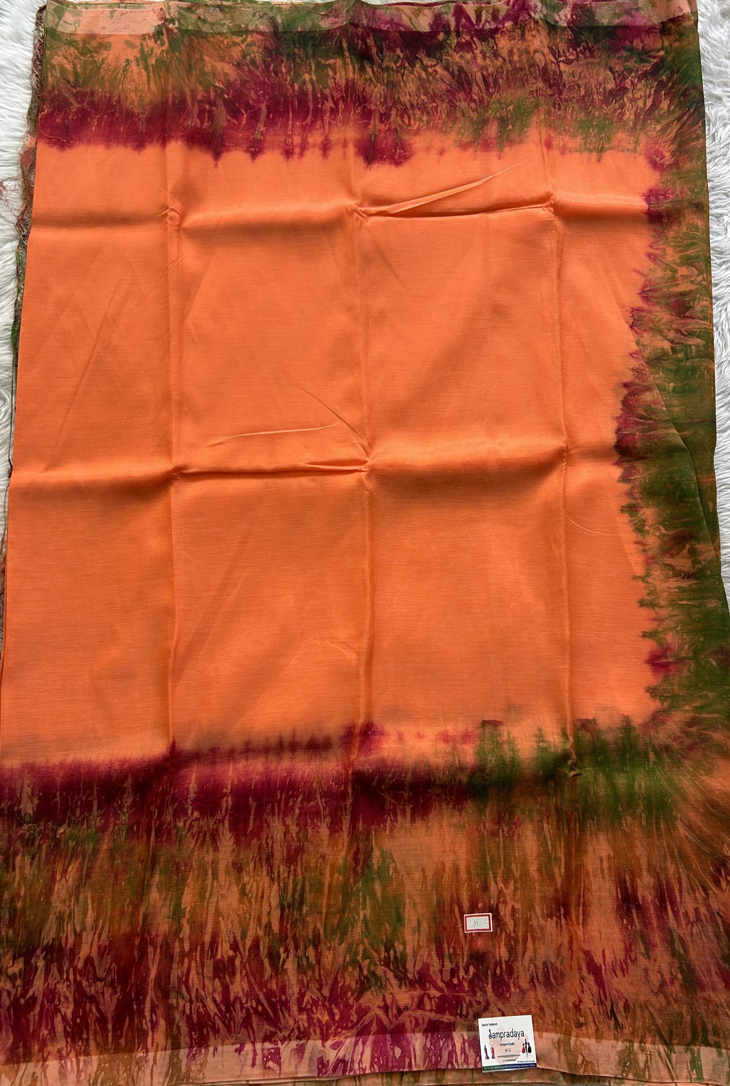 Mangalagiri Pattu Shibori Saree Orange colored complemented with a Borderless. - Sampradaya Designer Studio