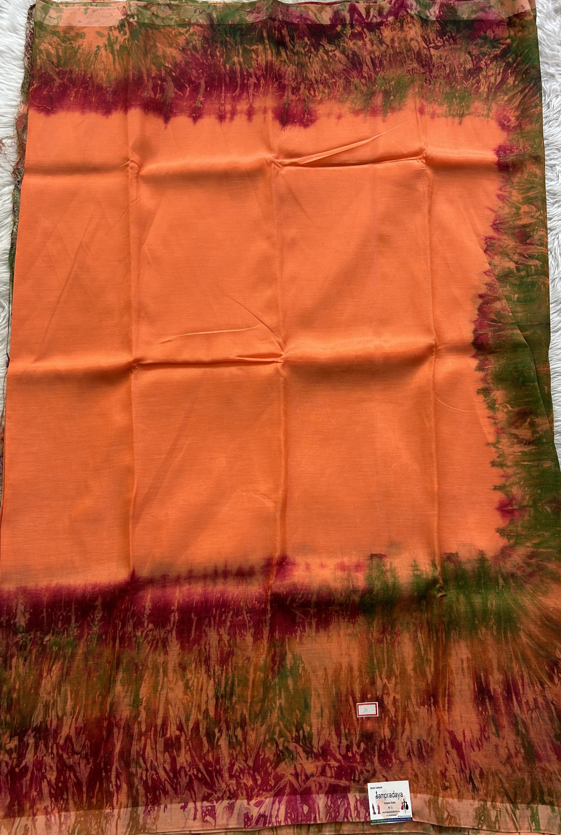 Mangalagiri Pattu Shibori Saree Orange colored complemented with a Borderless. - Sampradaya Designer Studio