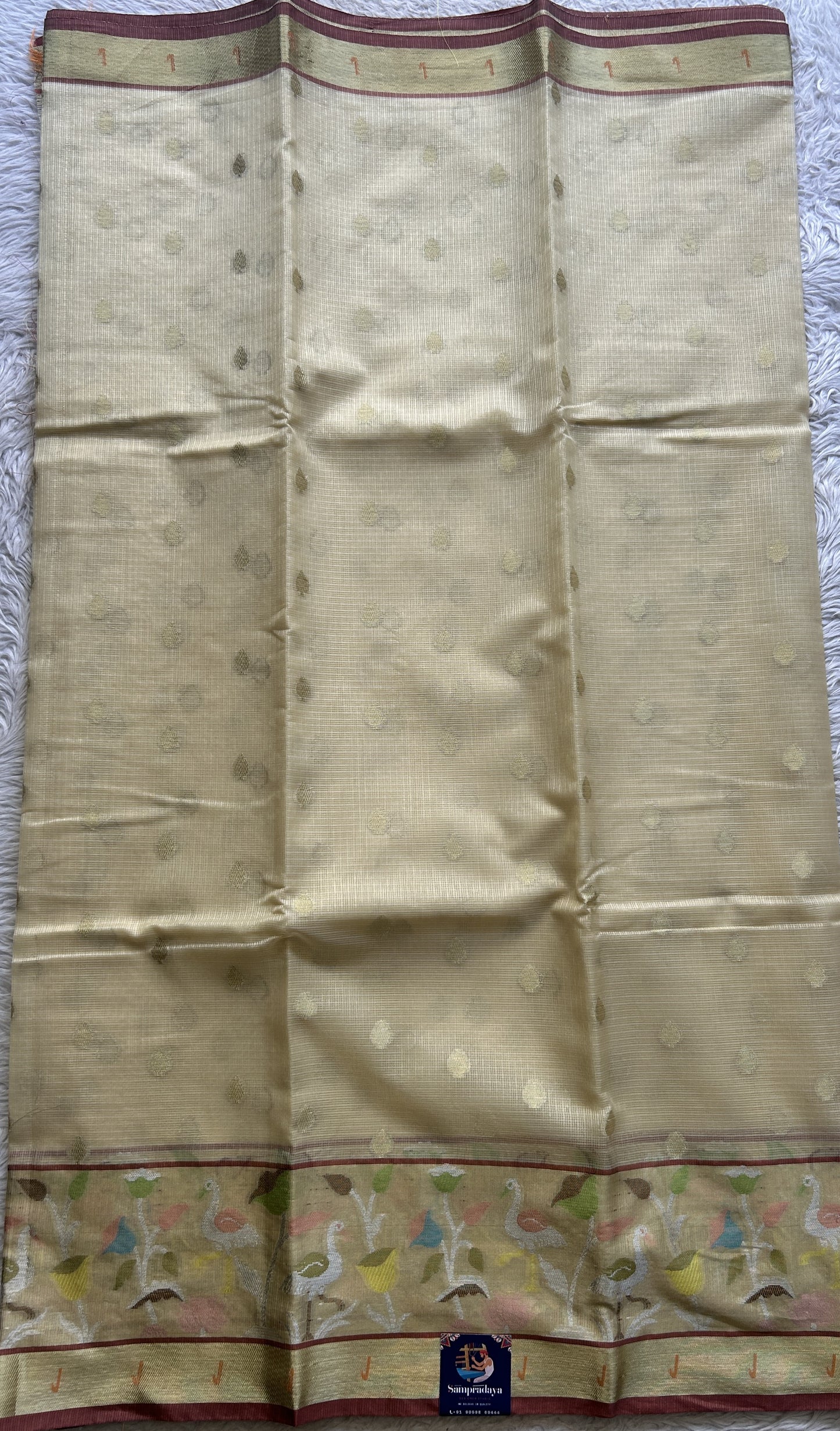 Silk kota Saree Beige colored Complemented with a Muniya Border. - Sampradaya Designer Studio