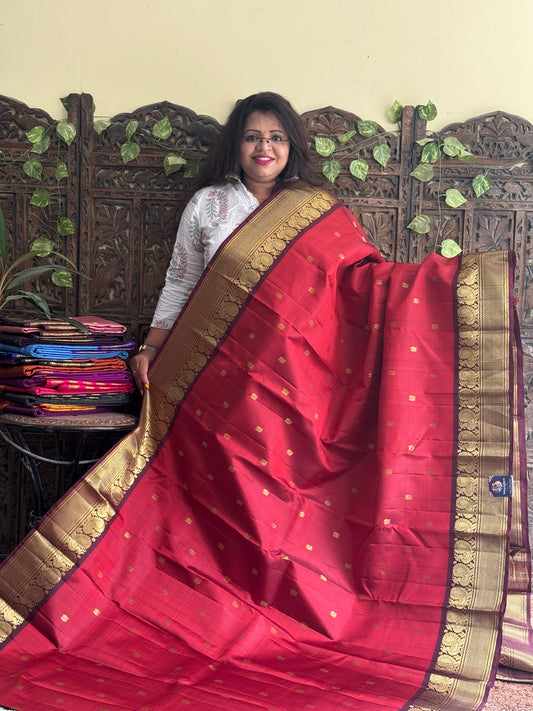 Pure Kanjivaram Silk Saree Maroon Colored Complemented with Brown color Border with a Gold Zari Weaving. - Sampradaya Designer Studio