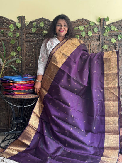 Pure Kanjivaram Silk Saree Dark Purple Complemented with a Gold Zari Border. - Sampradaya Designer Studio