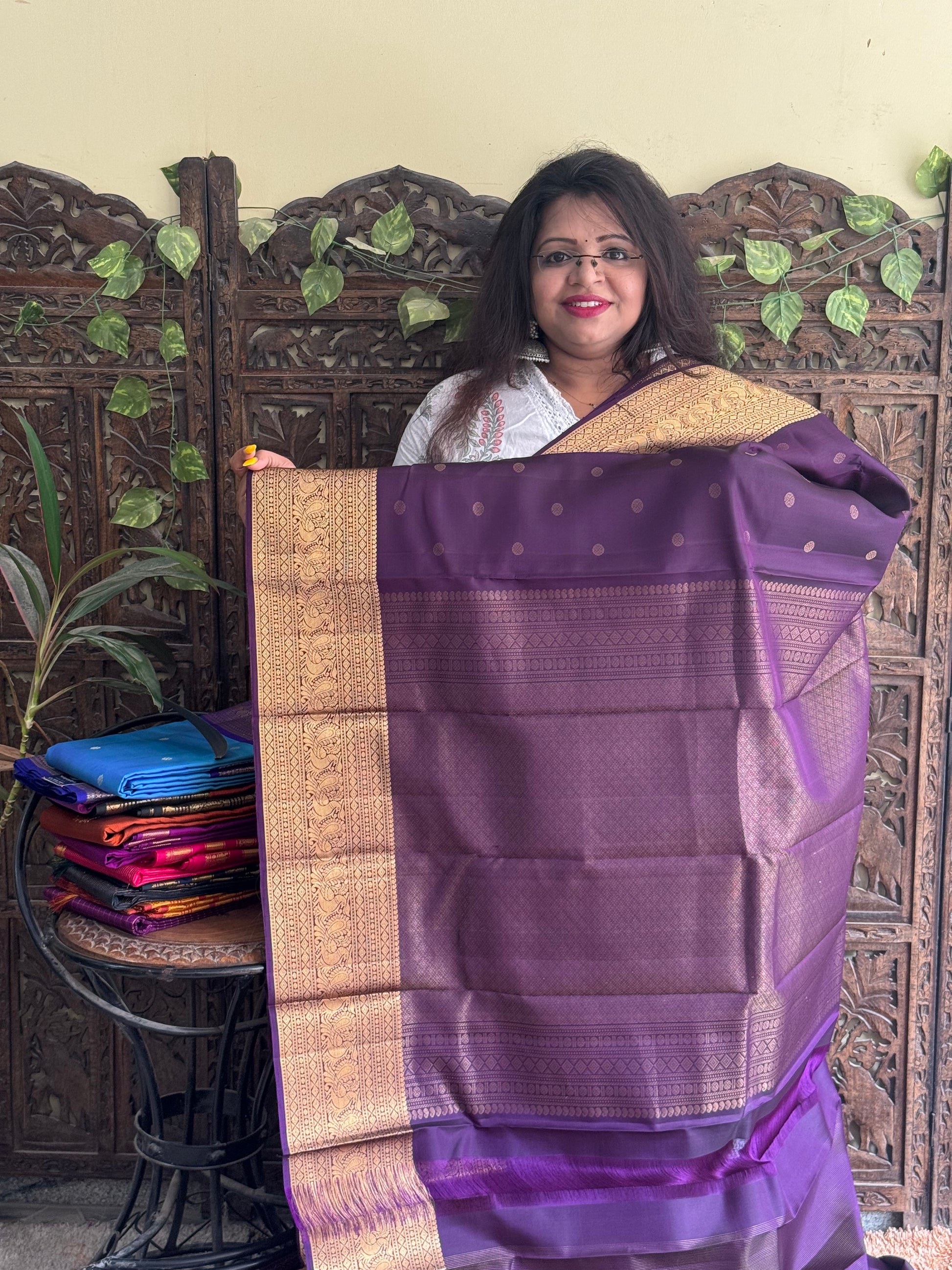 Pure Kanjivaram Silk Saree Dark Purple Complemented with a Gold Zari Border. - Sampradaya Designer Studio