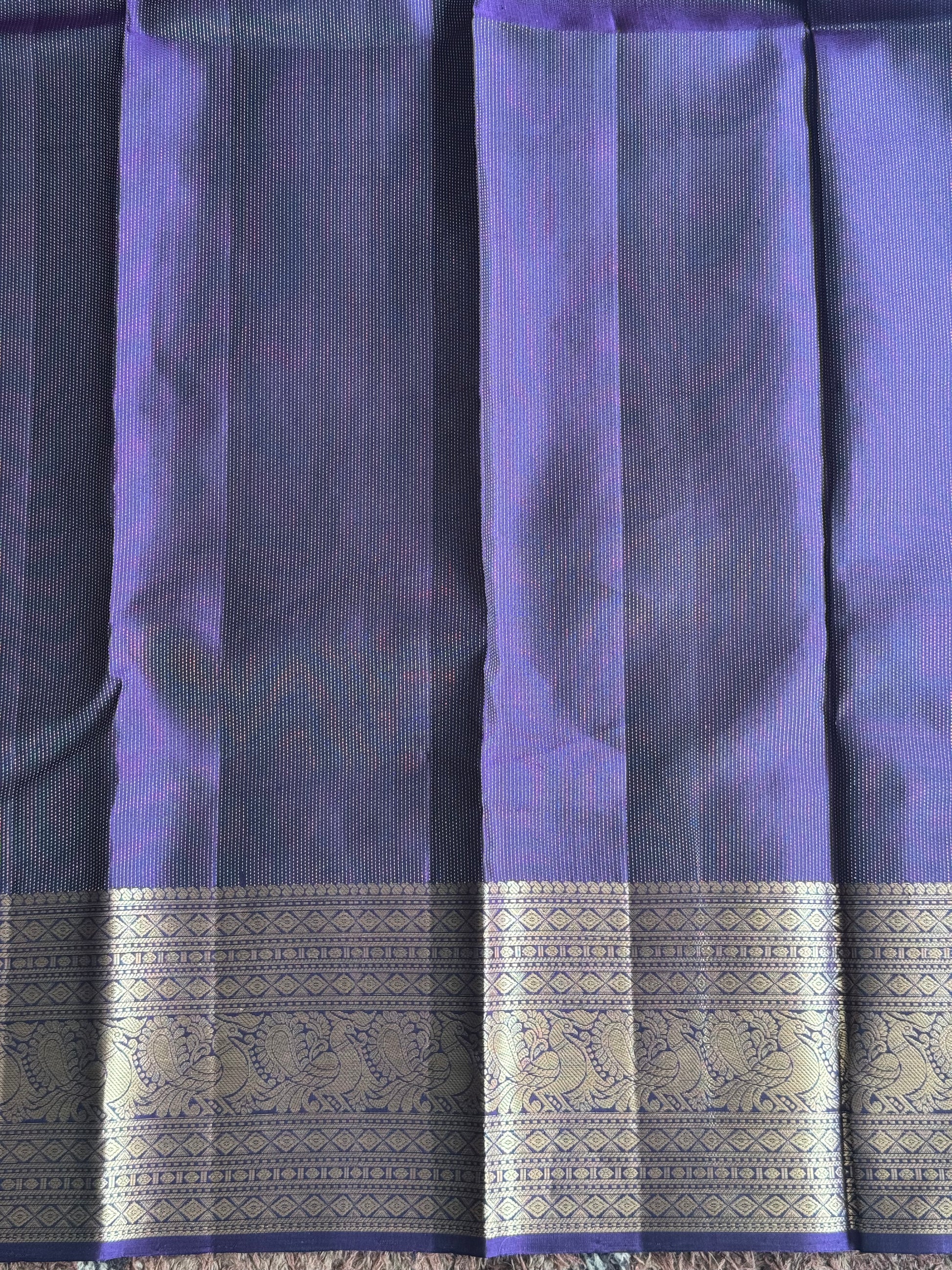 Pure Kanjivaram Silk Saree Dark Purple Complemented with a Gold Zari Border. - Sampradaya Designer Studio