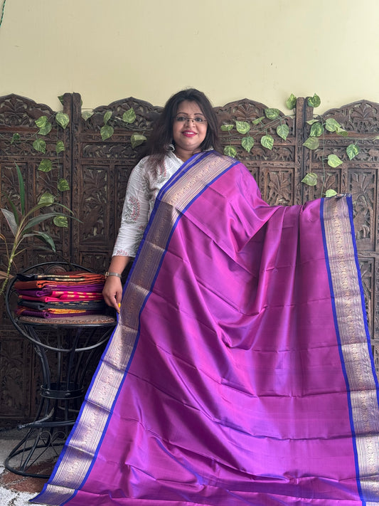 Pure Kanjivaram Silk Saree Purple Colored Complemented with Blue Color Border with a Gold Zari Weaving. - Sampradaya Designer Studio