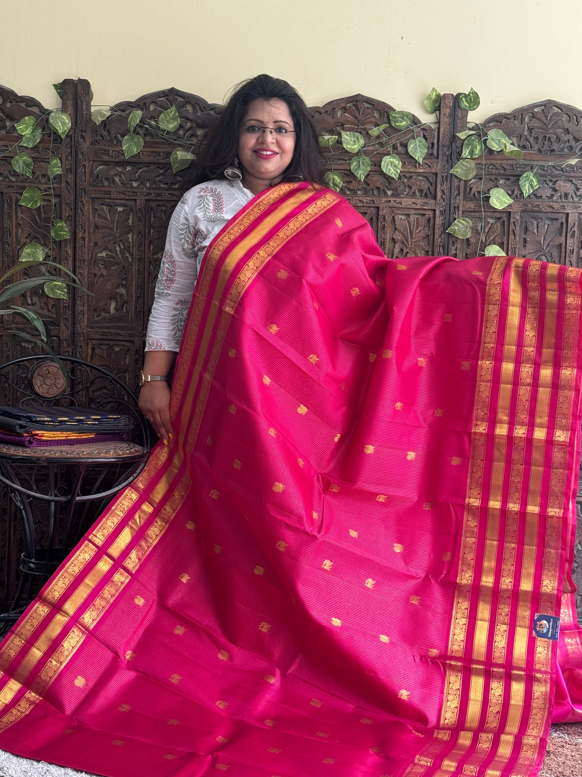 Pure Kanjivaram Silk Saree Dark Pink Colored Complemented with a Gold Zari Border. - Sampradaya Designer Studio