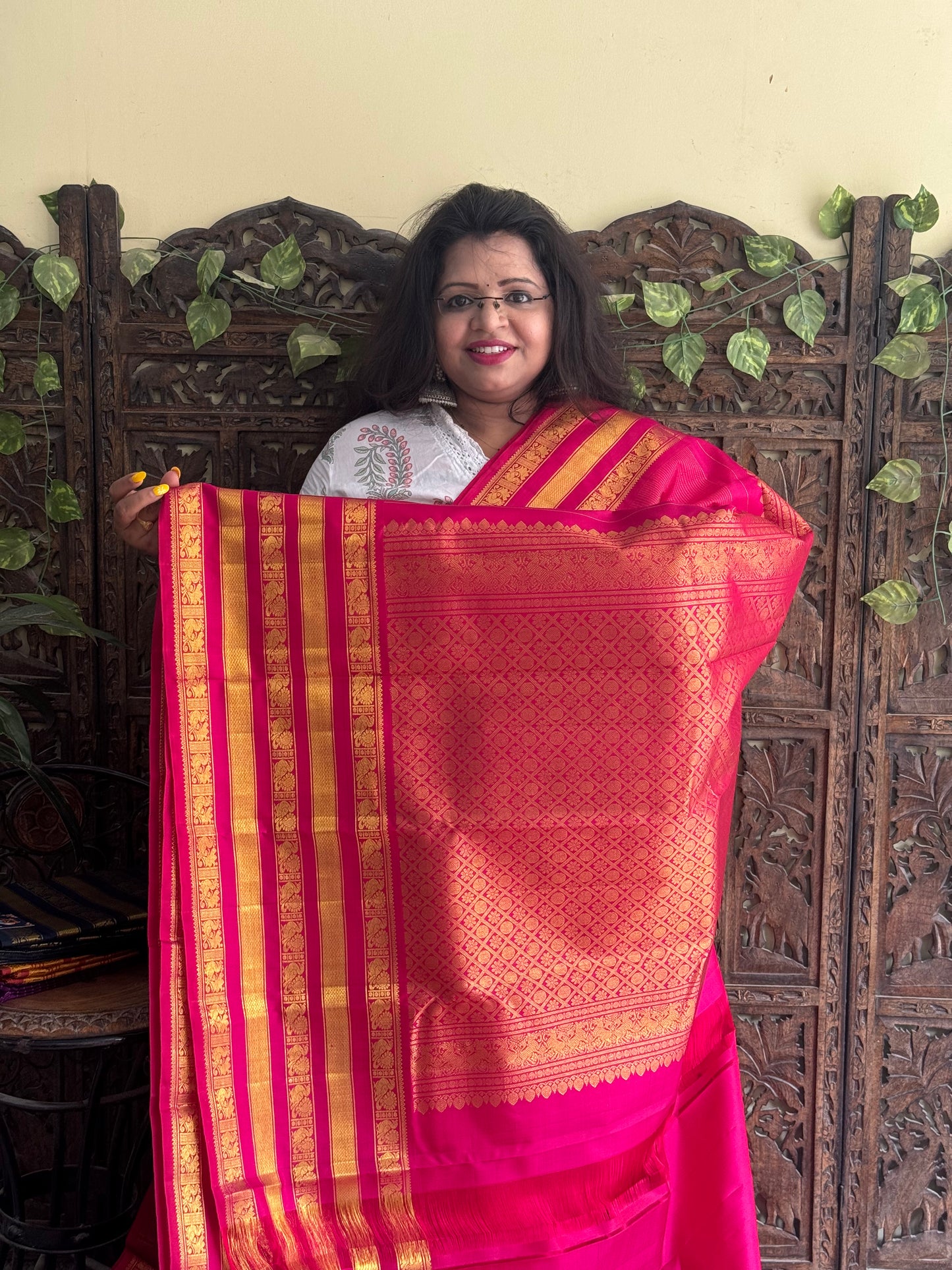 Pure Kanjivaram Silk Saree Dark Pink Colored Complemented with a Gold Zari Border. - Sampradaya Designer Studio