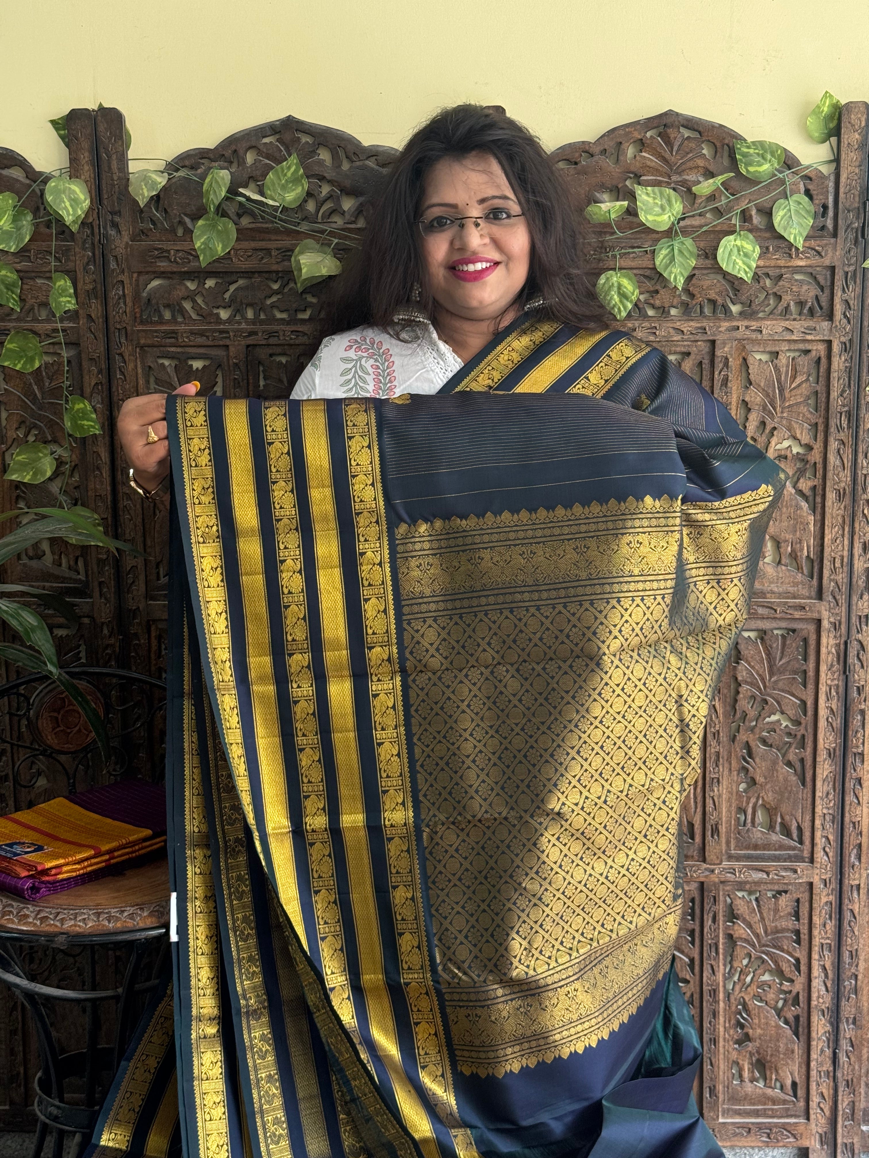 Pure Kanjivaram Silk Saree Peacock Blue Complemented with a Gold