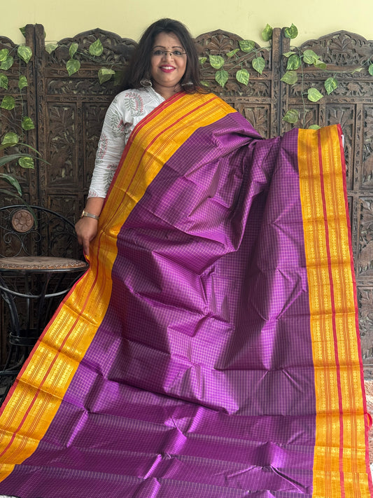 Pure Kanjivaram Silk Saree Purple Colored Complemented with Mustard Color Border with a Gold Zari Weaving. - Sampradaya Designer Studio