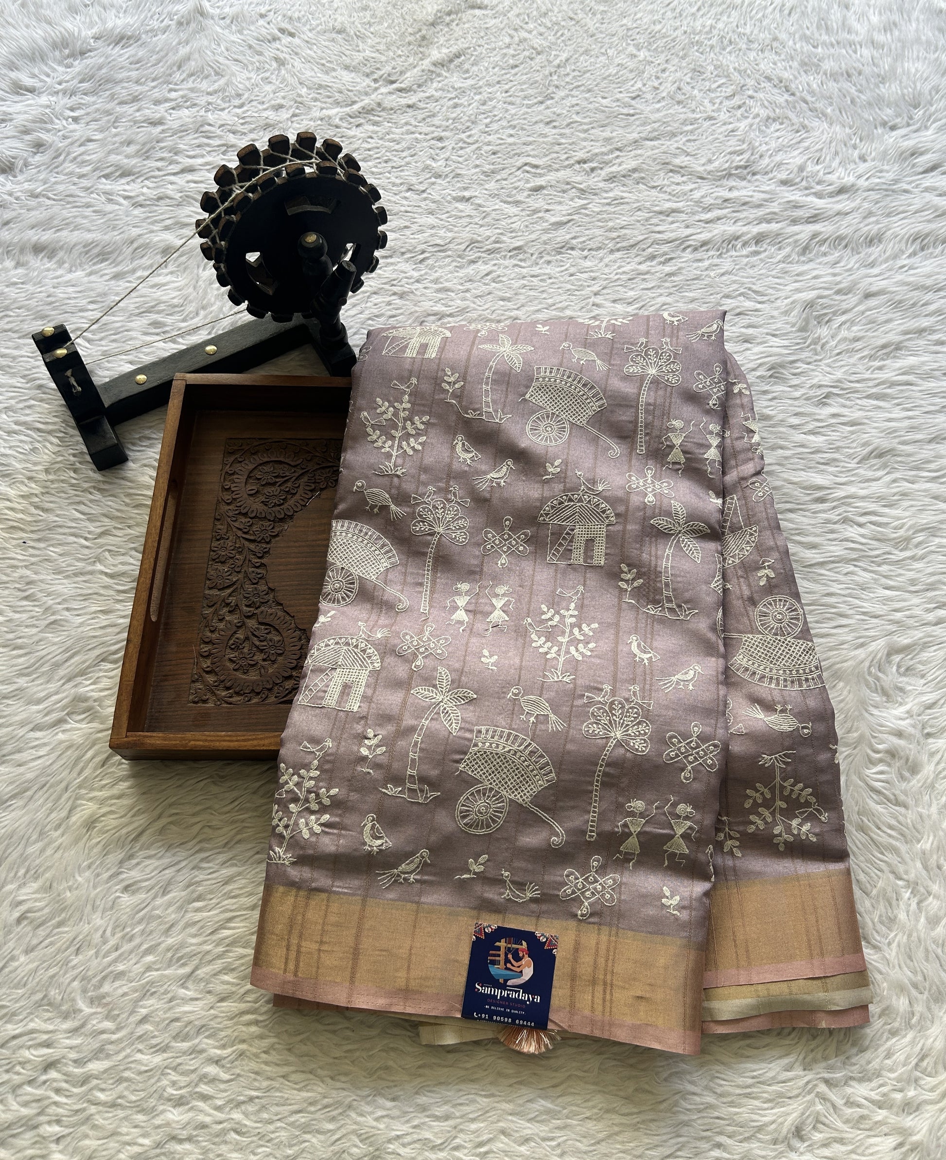 Semi Tussar Saree Light Lavender Colored complemented with a Peach Zari Border. - Sampradaya Designer Studio