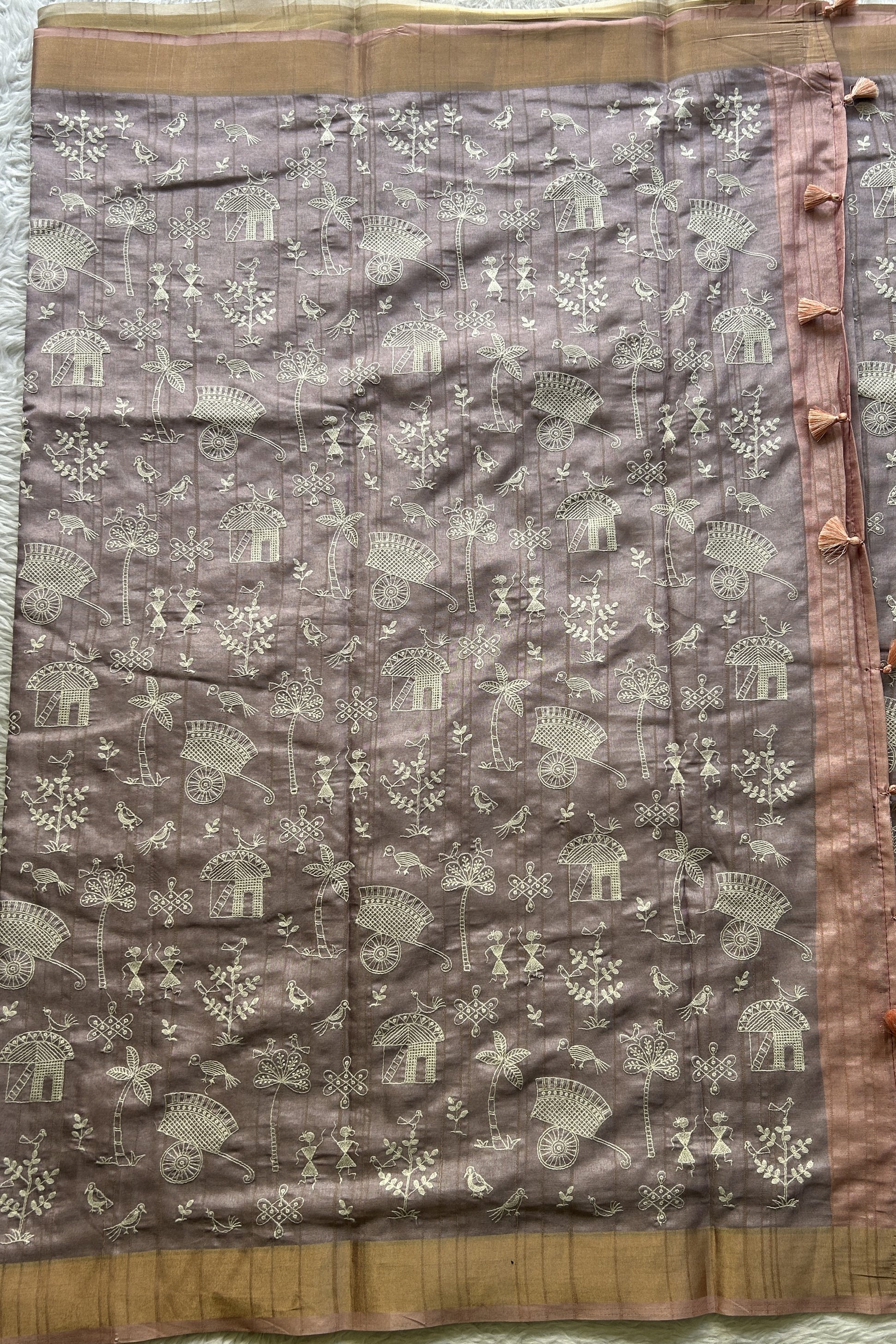 Semi Tussar Saree Light Lavender Colored complemented with a Peach Zari Border. - Sampradaya Designer Studio