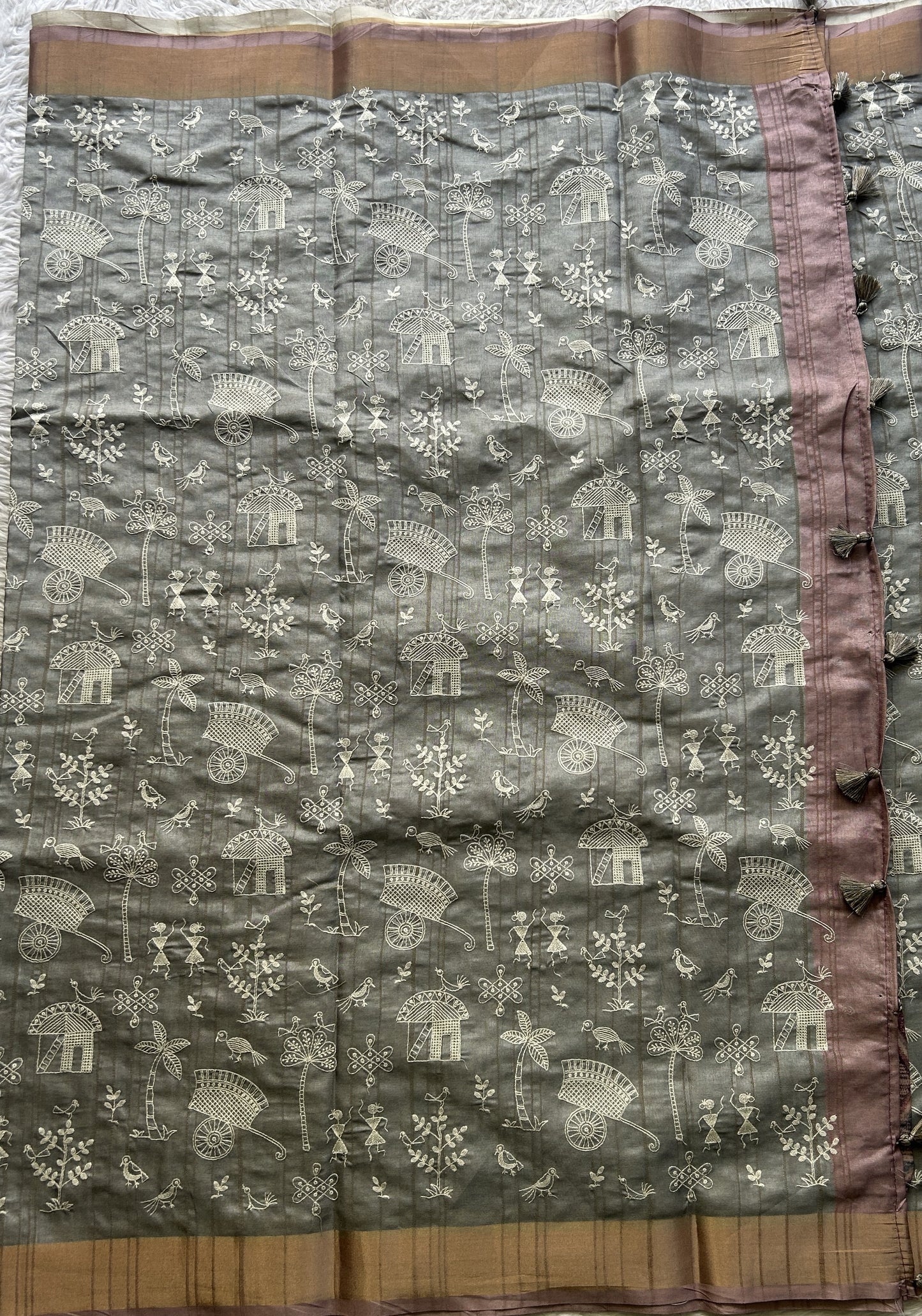 Semi Tussar Saree Gray Colored complemented with a Light Pink Zari Border. - Sampradaya Designer Studio