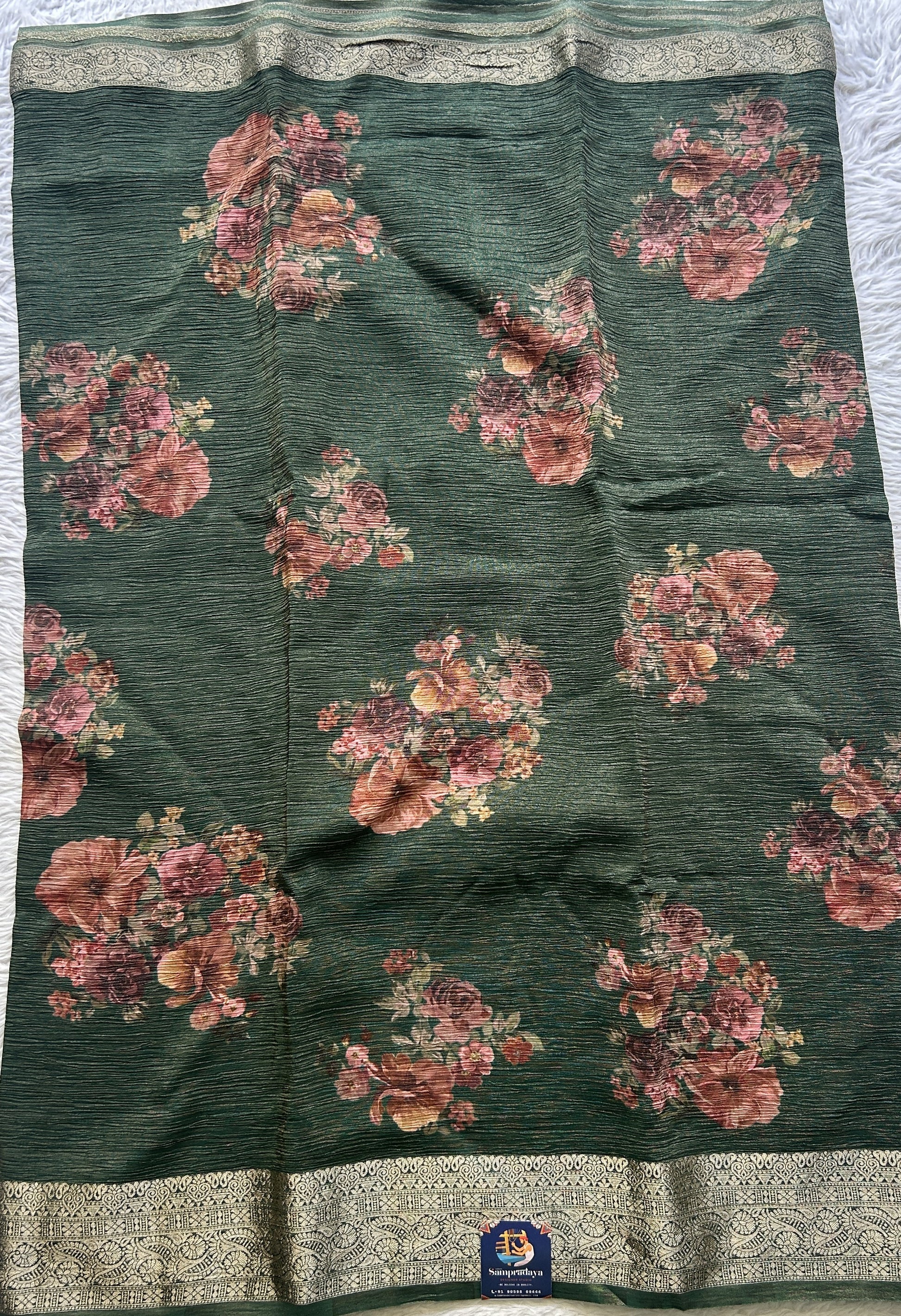 Banarasi Fancy Crushed Saree Bottle Green Colored Complemented with a Zari Border. - Sampradaya Designer Studio