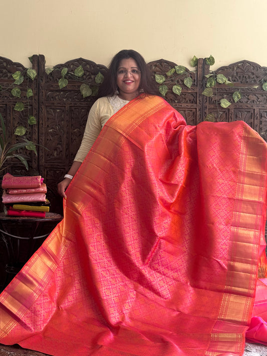 Pure Kanjivaram Silk Saree Orange Colored Complemented with Gold Zari Weaving Border. - Sampradaya Designer Studio