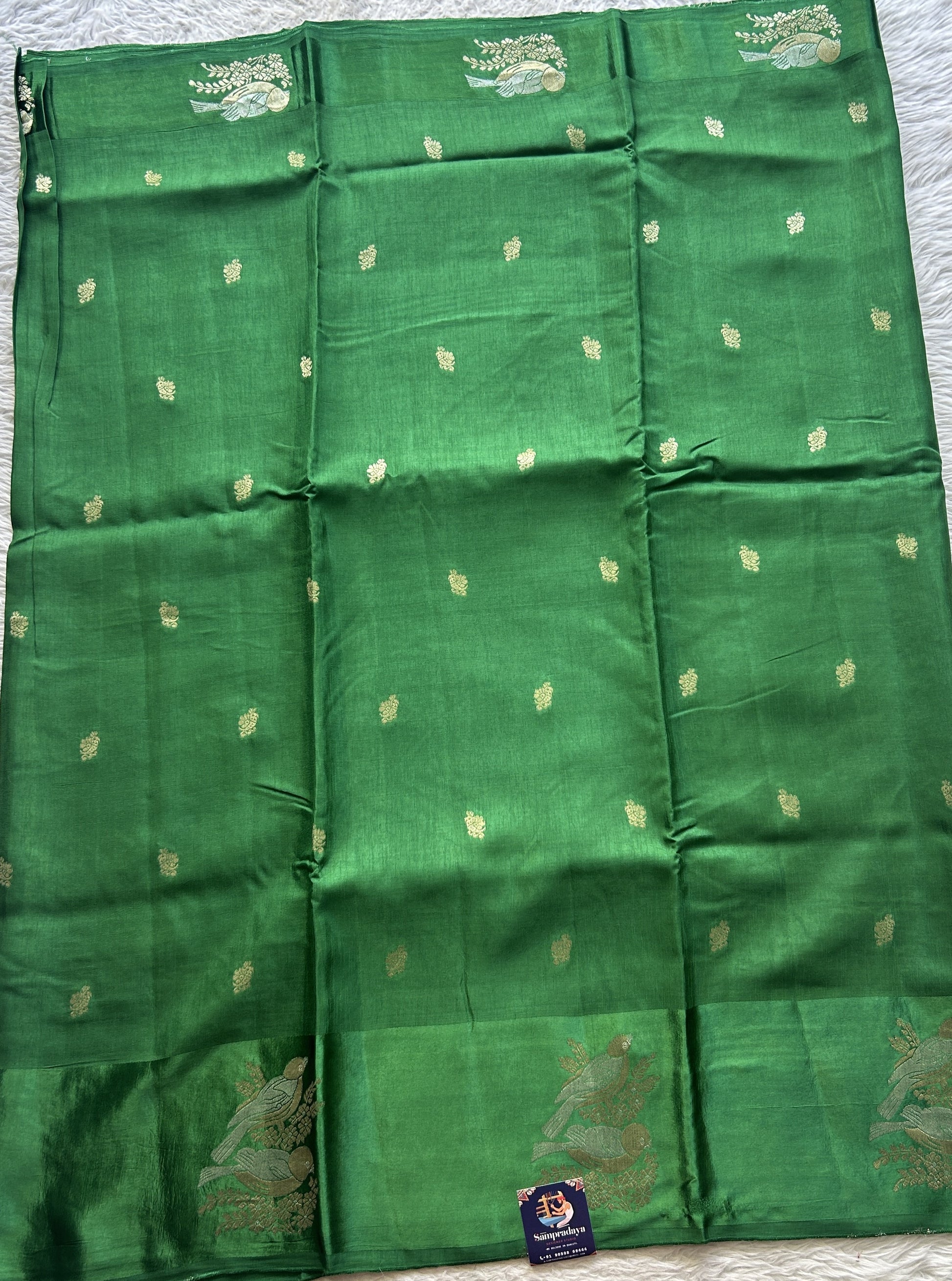 Mona Silk Saree Dark Green Colored Complemented with a Mashrur Border. - Sampradaya Designer Studio