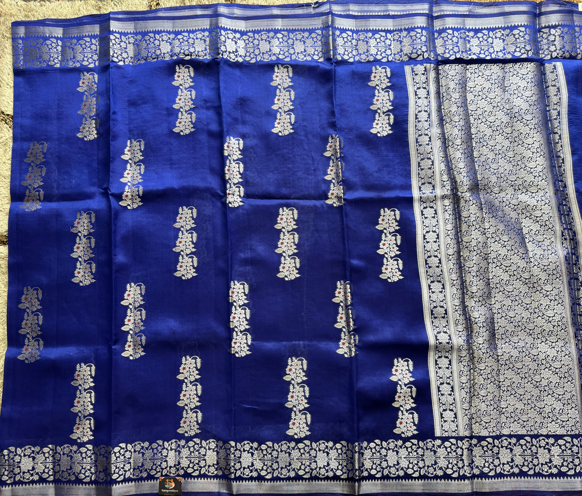 Pure Chiniya Silk Saree Blue Colored Elegantly Paired with a Gold Zari Border.