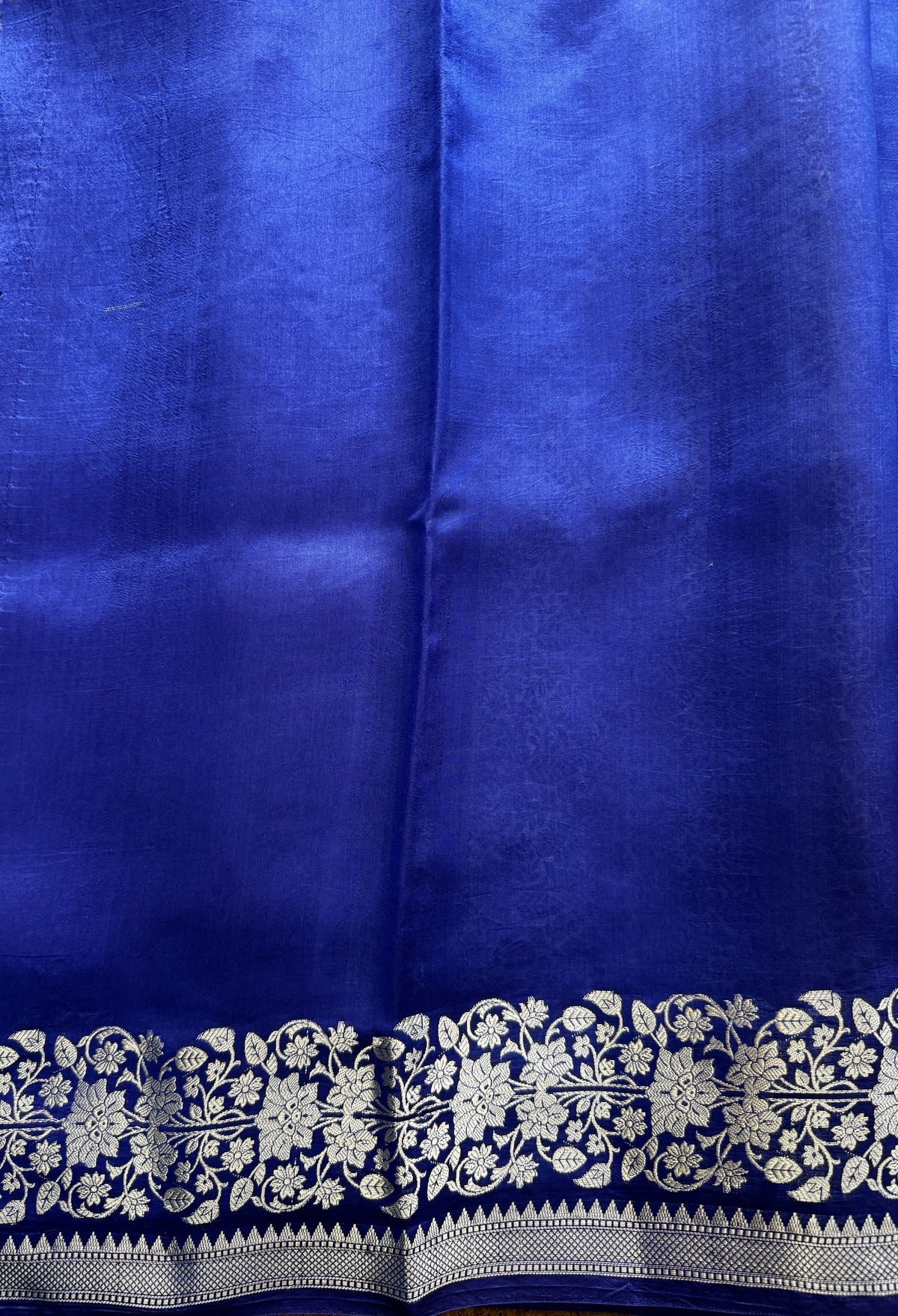 Pure Chiniya Silk Saree Blue Colored Elegantly Paired with a Gold Zari Border.