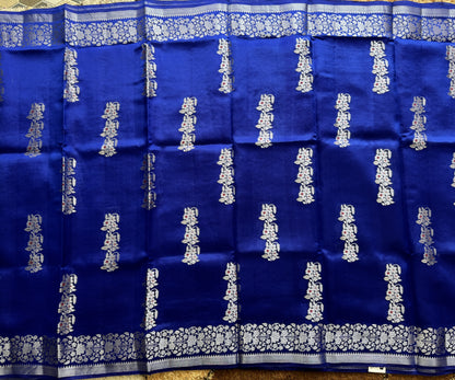 Pure Chiniya Silk Saree Blue Colored Elegantly Paired with a Gold Zari Border.
