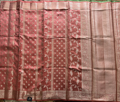 Pure Chiniya Silk Saree Peach Colored Elegantly Paired with a Gold Zari Border.