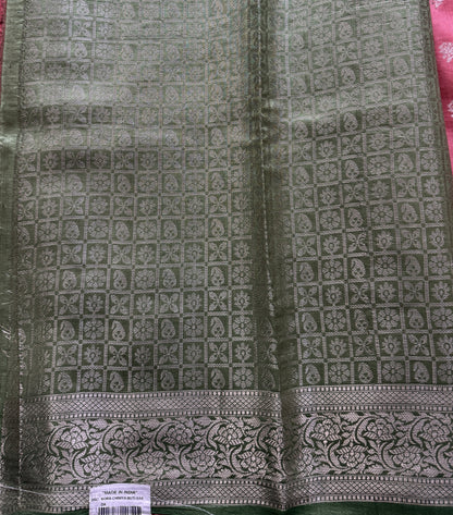 Pure Chiniya Silk Saree Peach Colored Elegantly Paired with a Gold Zari Border.