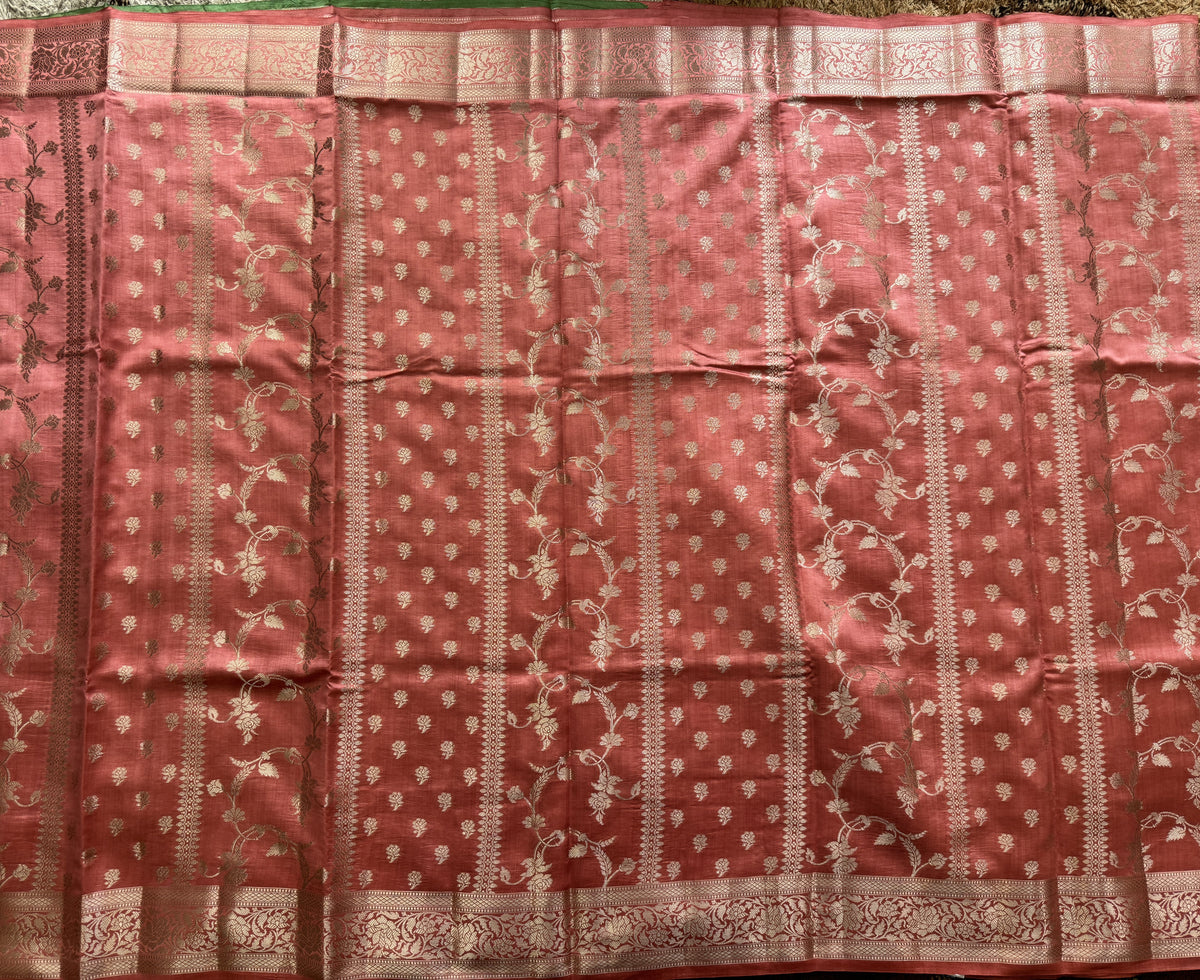 Pure Chiniya Silk Saree Peach Colored Elegantly Paired with a Gold Zari Border.