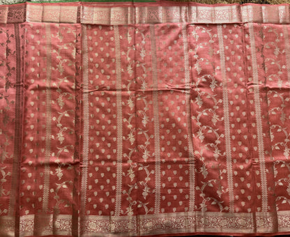 Pure Chiniya Silk Saree Peach Colored Elegantly Paired with a Gold Zari Border.