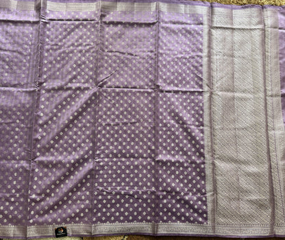 Pure Chiniya Silk Saree Lavender Colored Elegantly Paired with a Gold Zari Border.