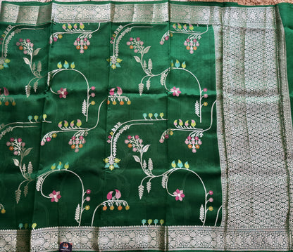 Pure Chiniya Silk Saree Parrot Green Colored Elegantly Paired with a Gold Zari Border.