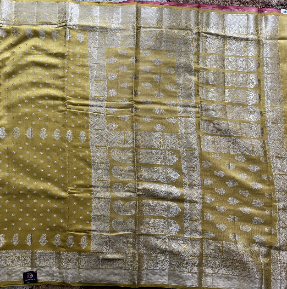 Pure Chiniya Silk Saree Yellow Colored Elegantly Paired with a Gold Zari Border.