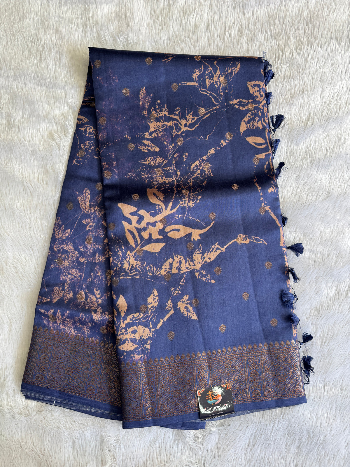 Pure Chiniya Silk Saree  Navy Blue Colored Elegantly Paired with a Gold Zari Border.