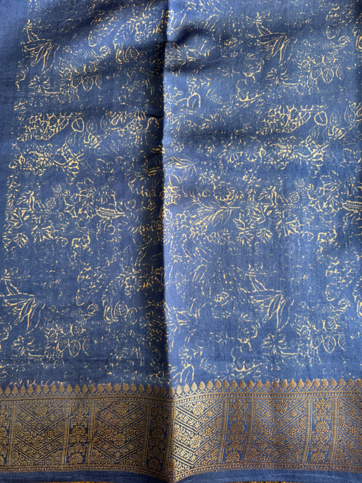 Pure Chiniya Silk Saree  Navy Blue Colored Elegantly Paired with a Gold Zari Border.