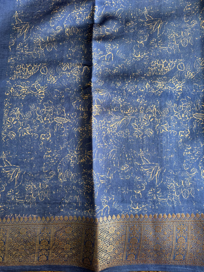 Pure Chiniya Silk Saree  Navy Blue Colored Elegantly Paired with a Gold Zari Border.