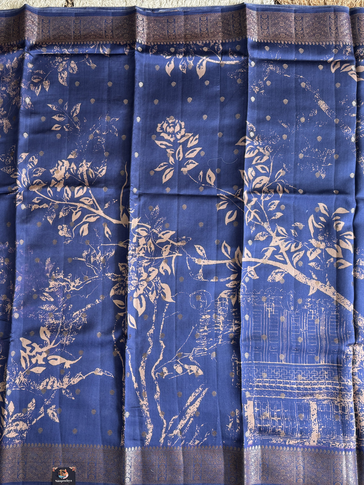 Pure Chiniya Silk Saree  Navy Blue Colored Elegantly Paired with a Gold Zari Border.